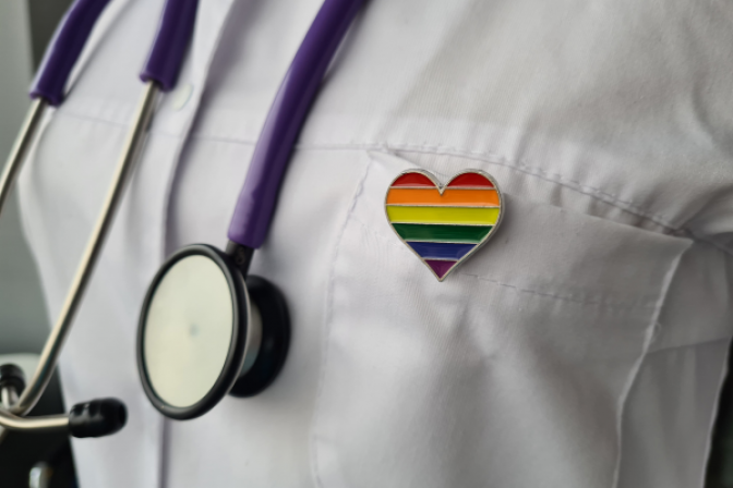 Doctor with lgbtq pride pin