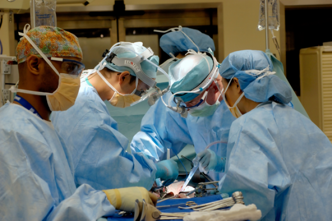 Surgeons performing a transplant