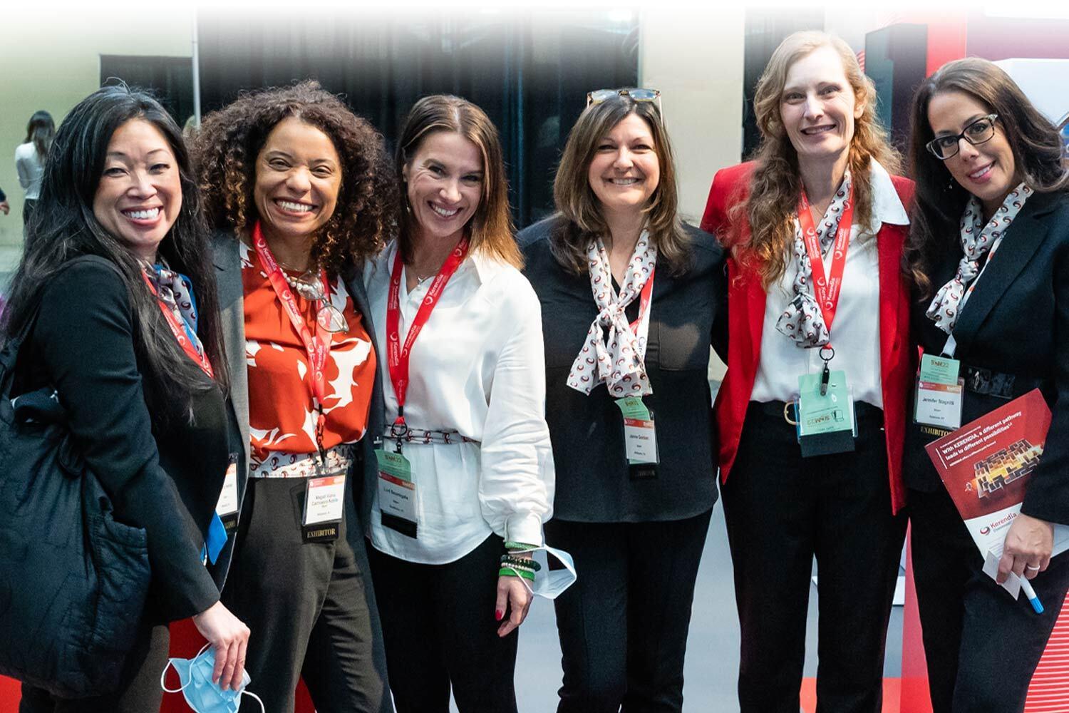 attendees smiling at a medical conference