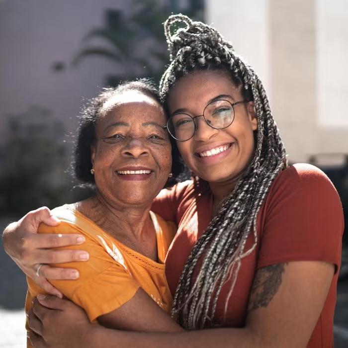 Two women embracing in a hug
