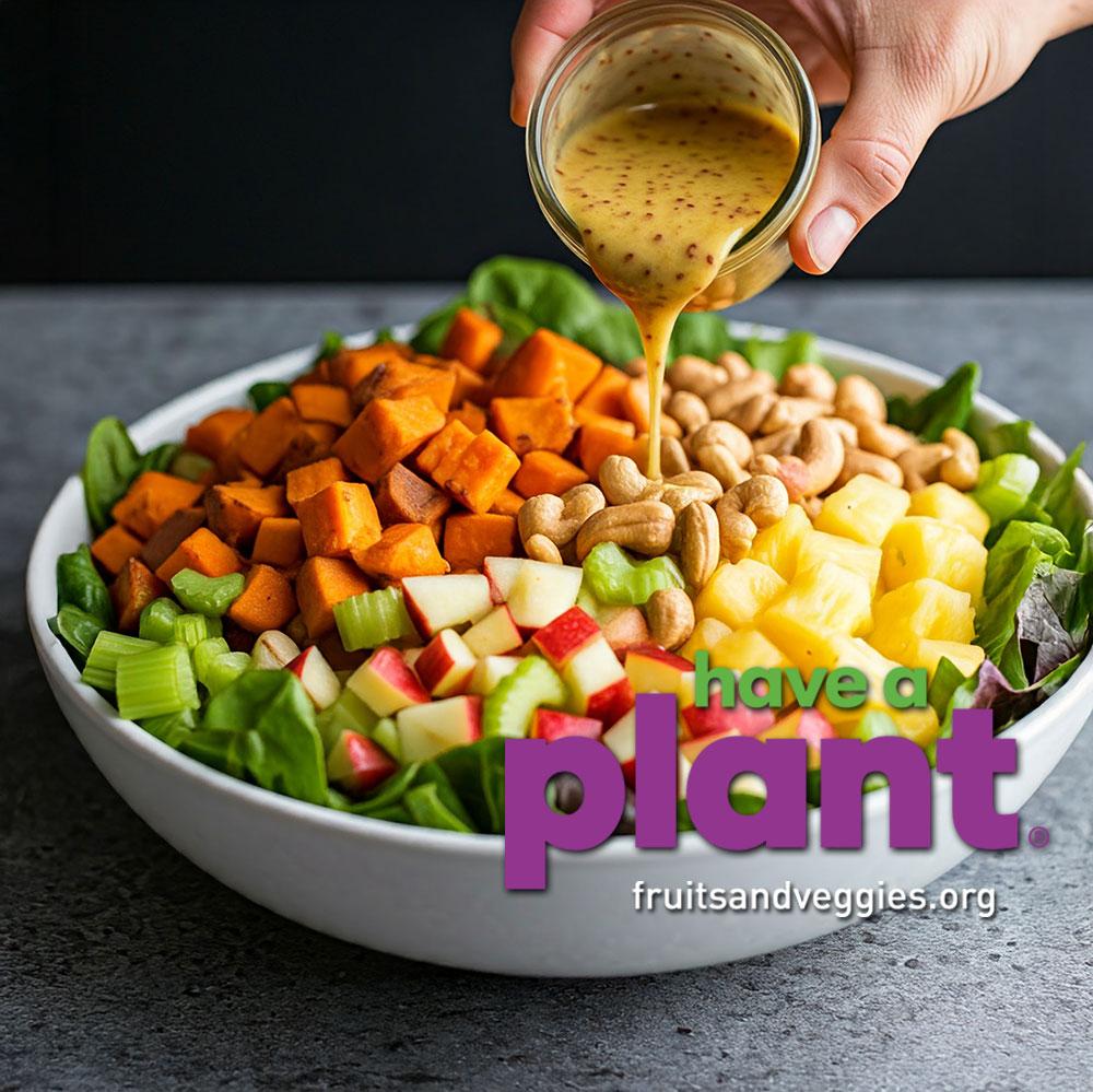 Sweet potato, celery, apple, pineapple, cashew salad with ginger honey mustard dressing, Have a Plant logo