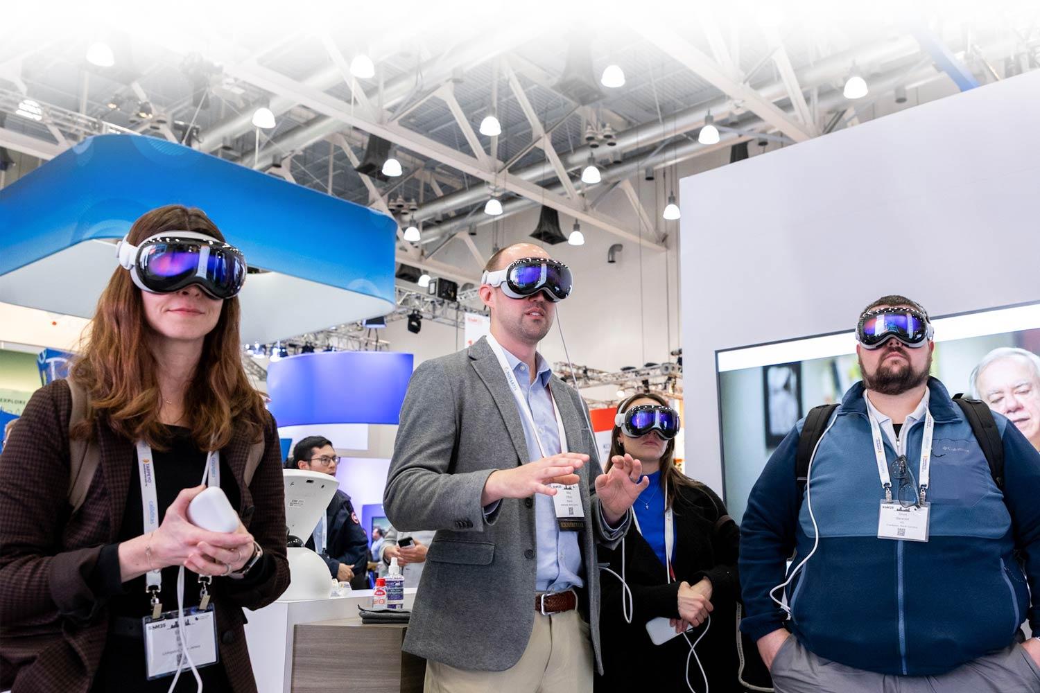 Healthcare professionals using VR headsets at SCM