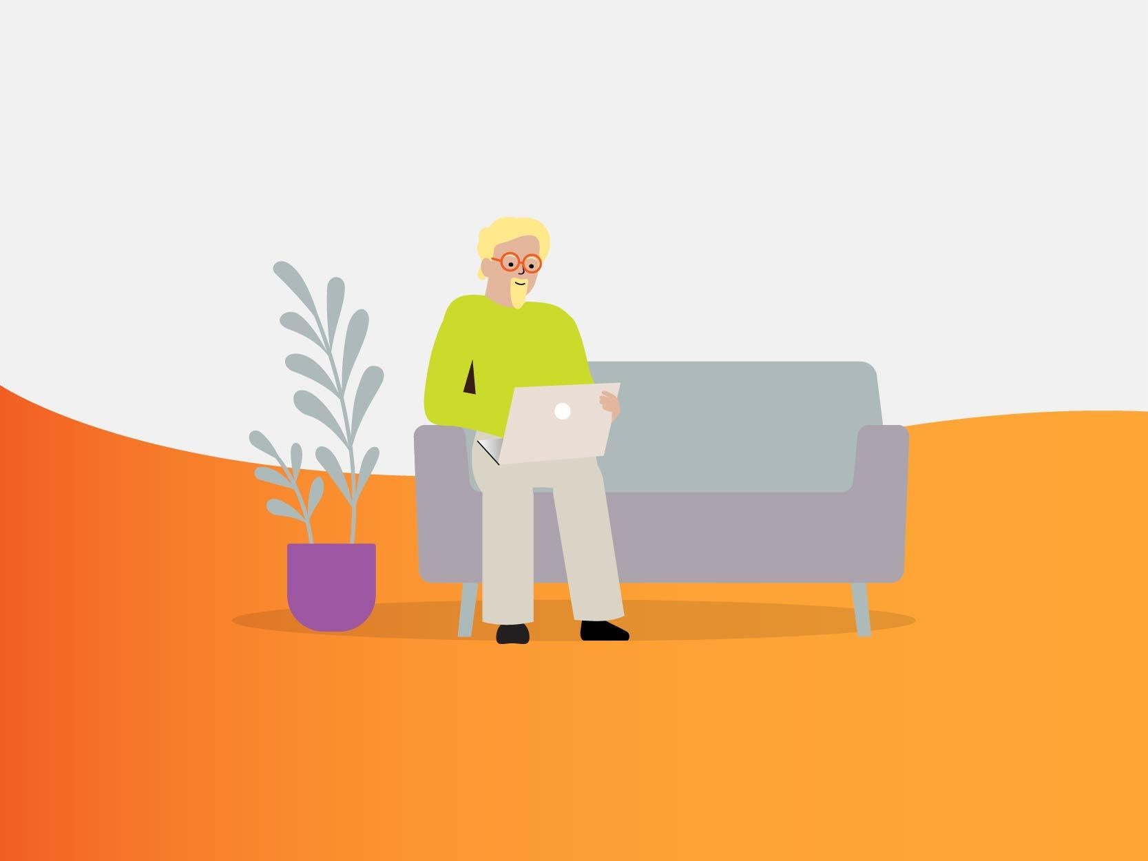 Middle-aged man sitting on couch looking at a laptop