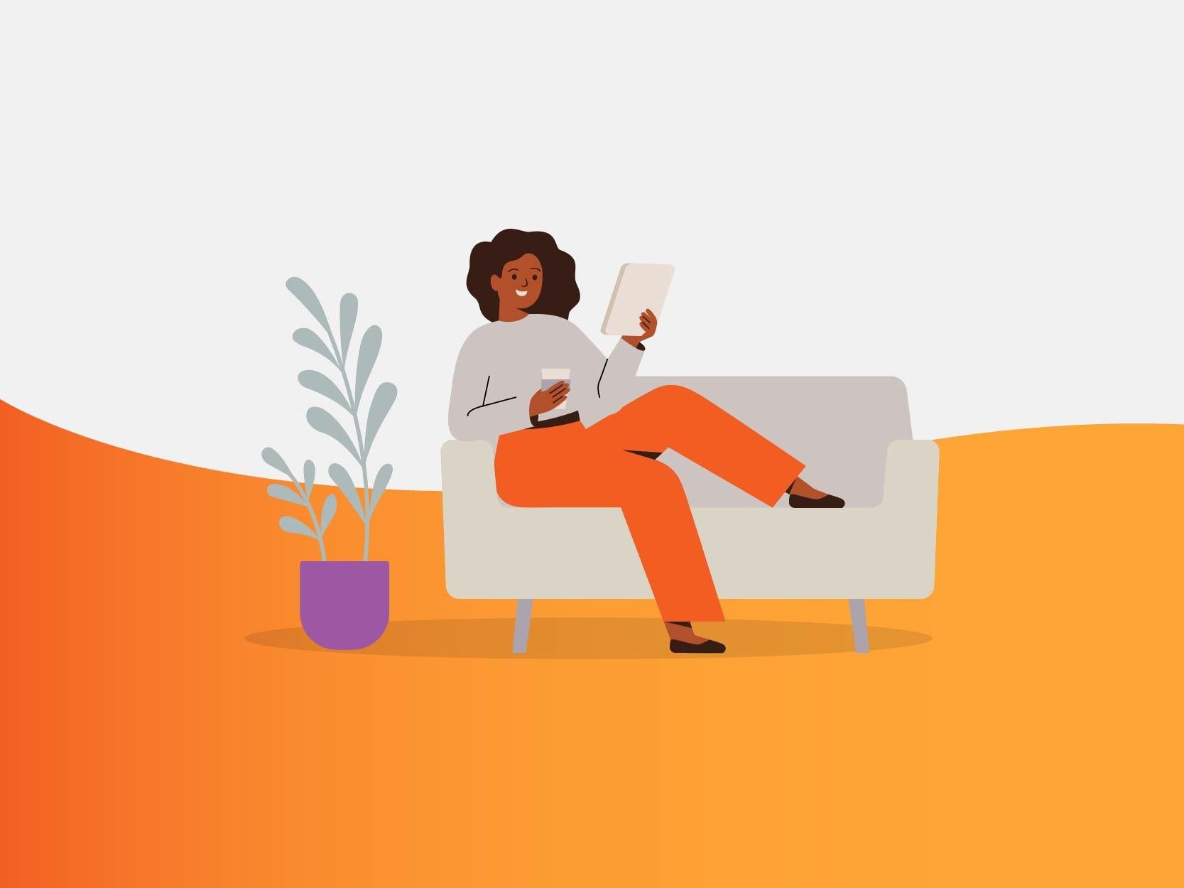 Young woman sitting on couch looking at tablet and drinking a glass of water