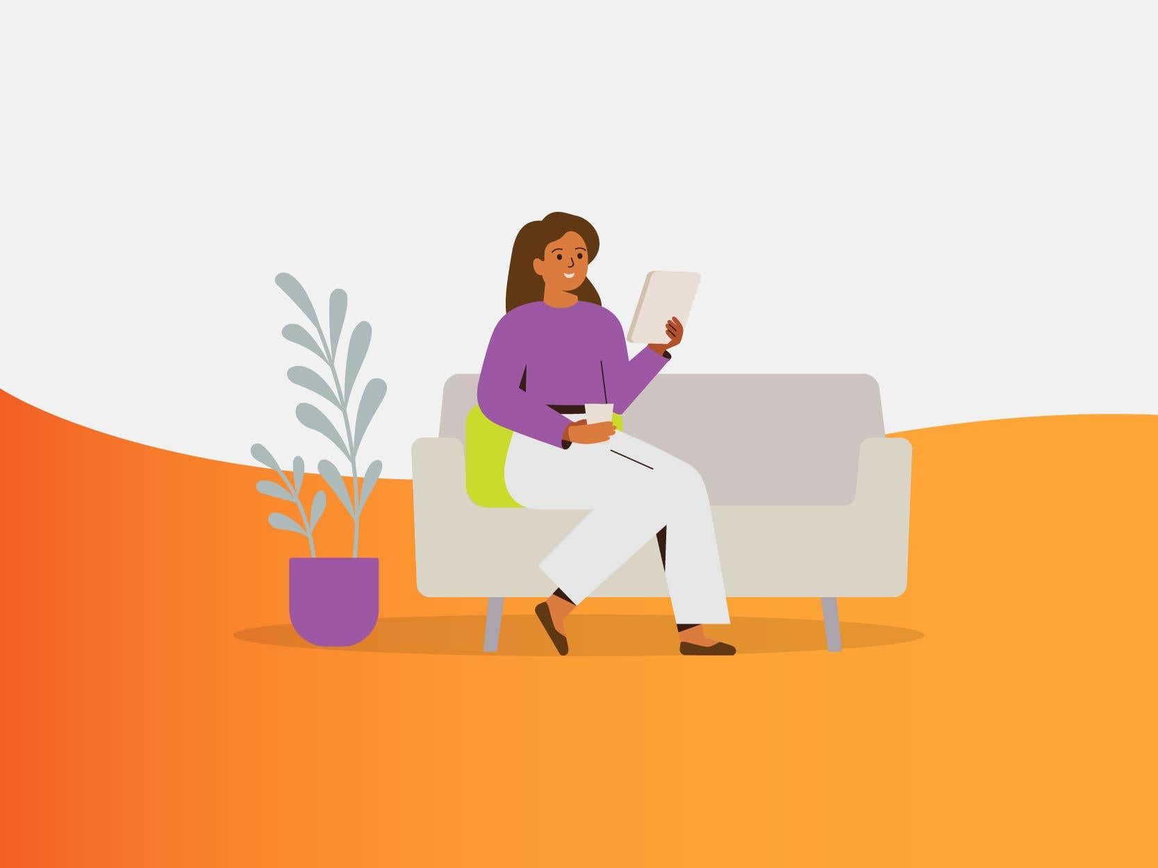 Young woman sitting on couch looking at tablet and drinking a glass of water