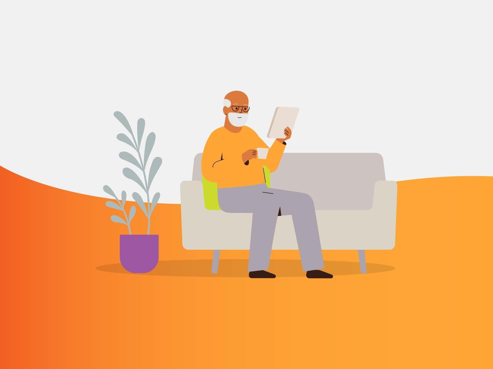 Older man sitting on couch looking at tablet and drinking a coffee