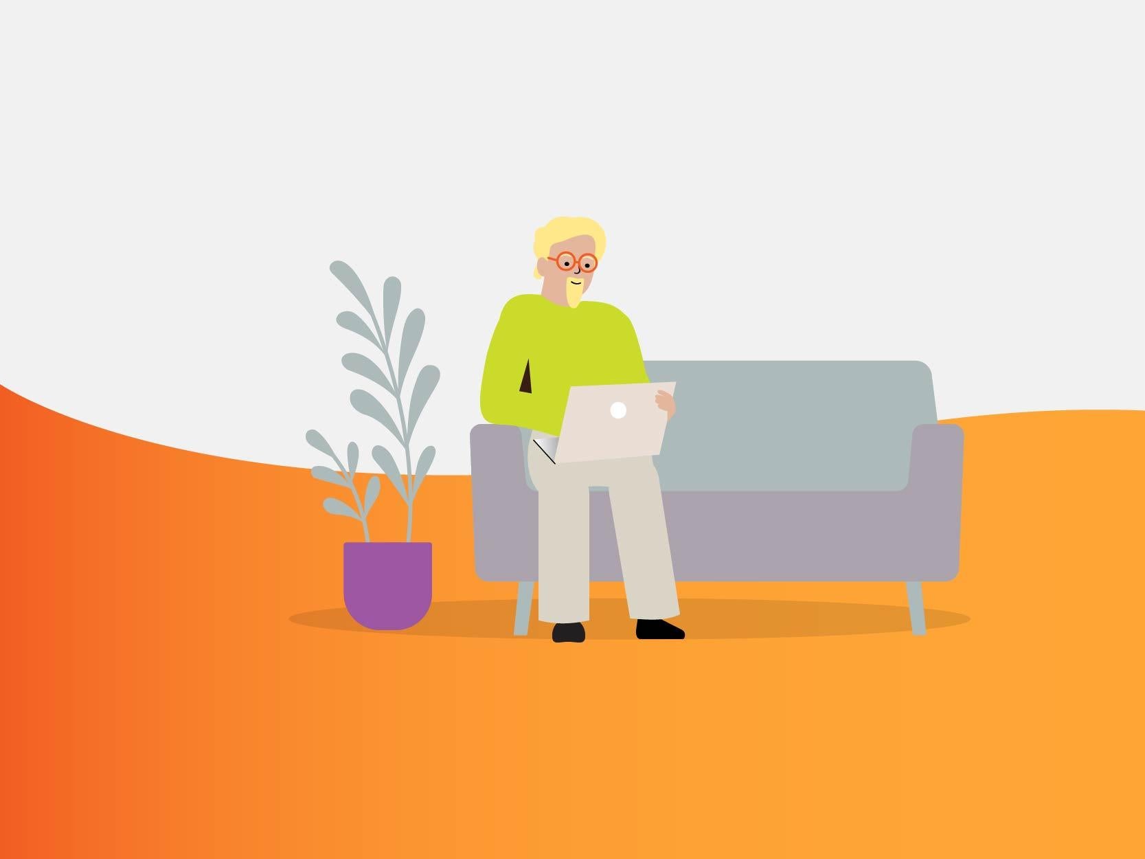 Middle-aged man sitting on couch looking at a laptop