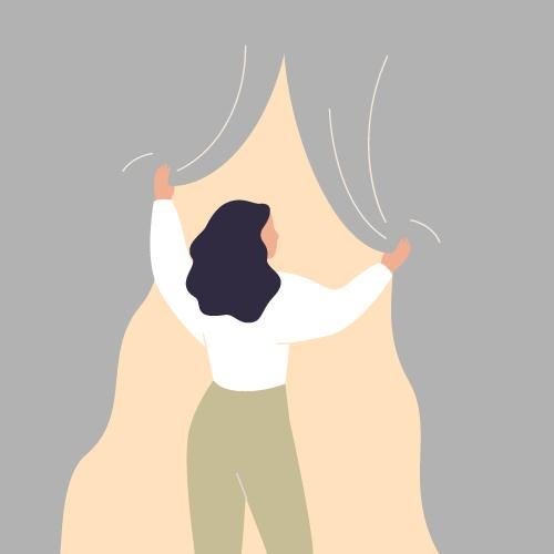 woman pulling curtains back