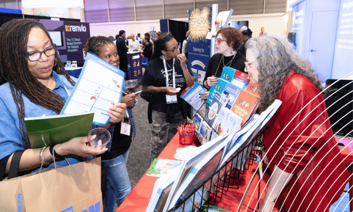 SCM attendees collecting materials