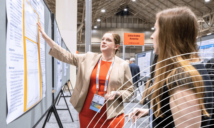 SCM attendee presenting their abstract poster