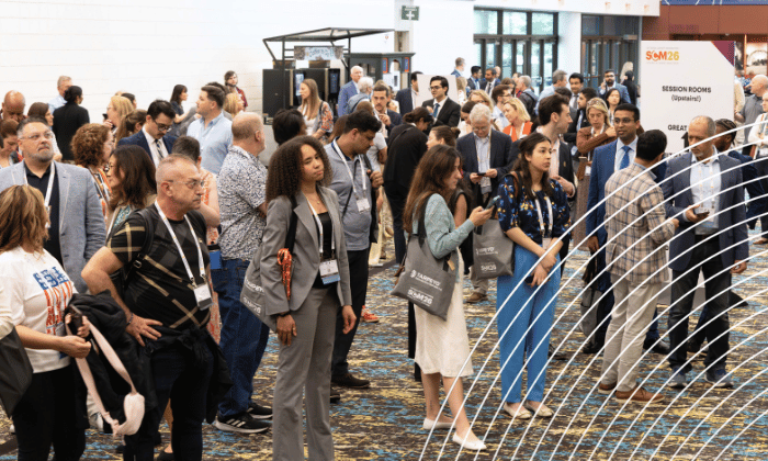 SCM attendees standing in the entry hall
