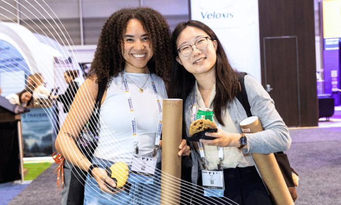 Two young SCM attendees posing together