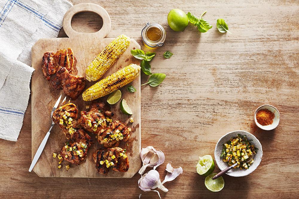 Grilled Chicken and Corn on Wood Table