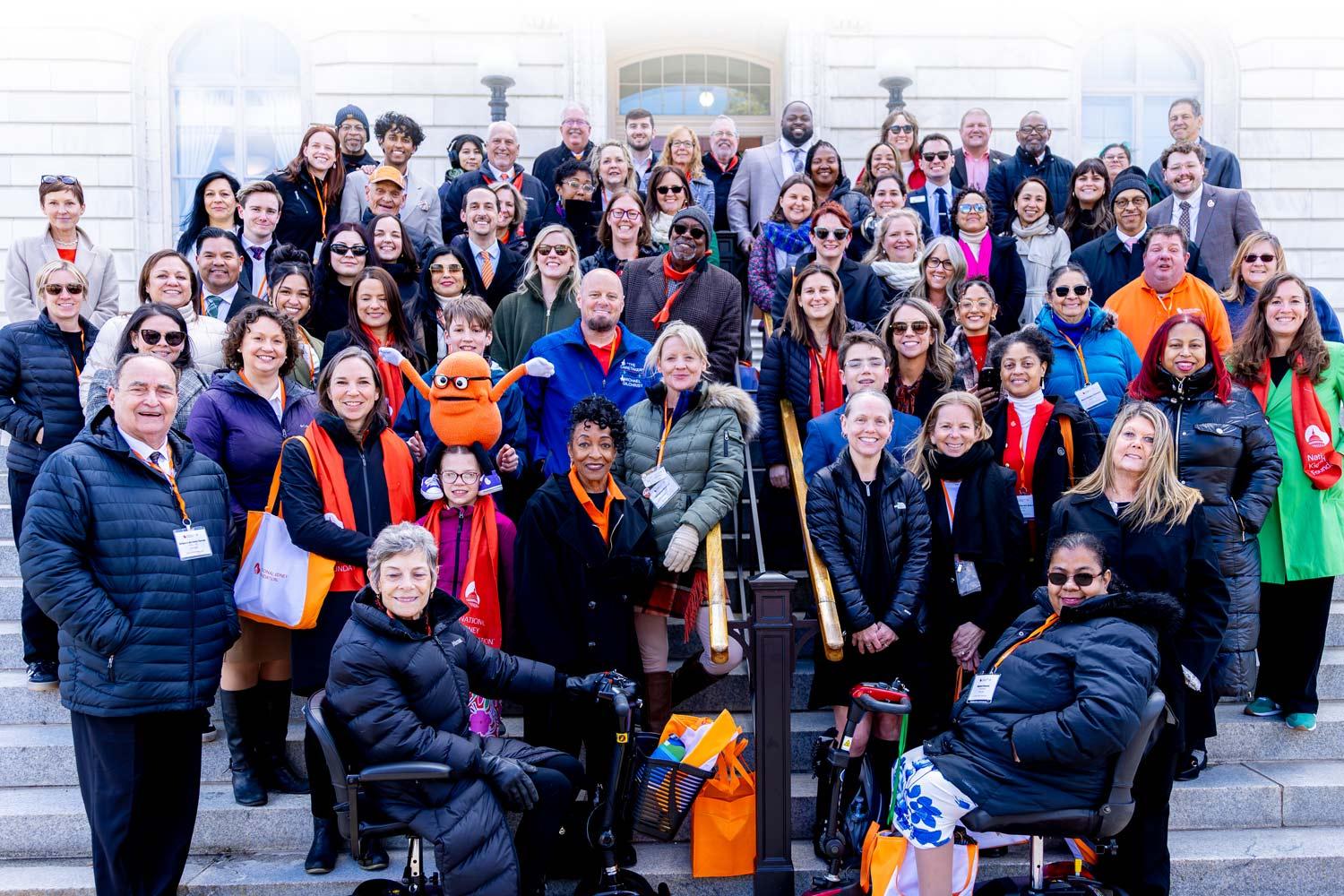 Kidney Patient Summit group posing on the steps