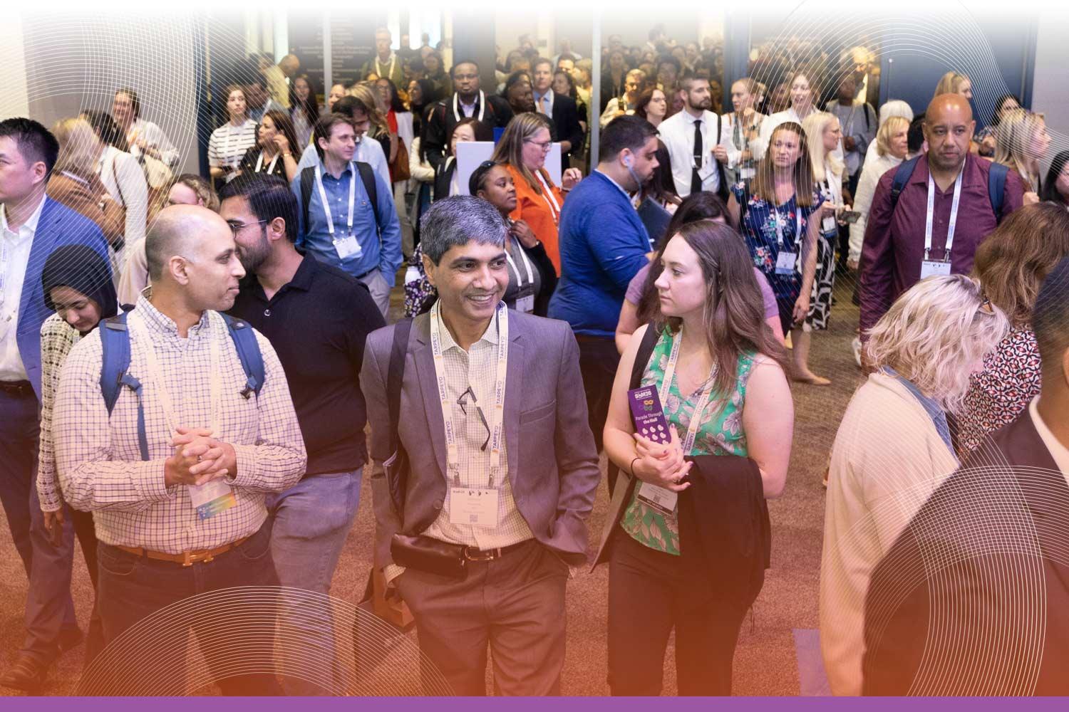 SCM attendees walking into the exhibit hall