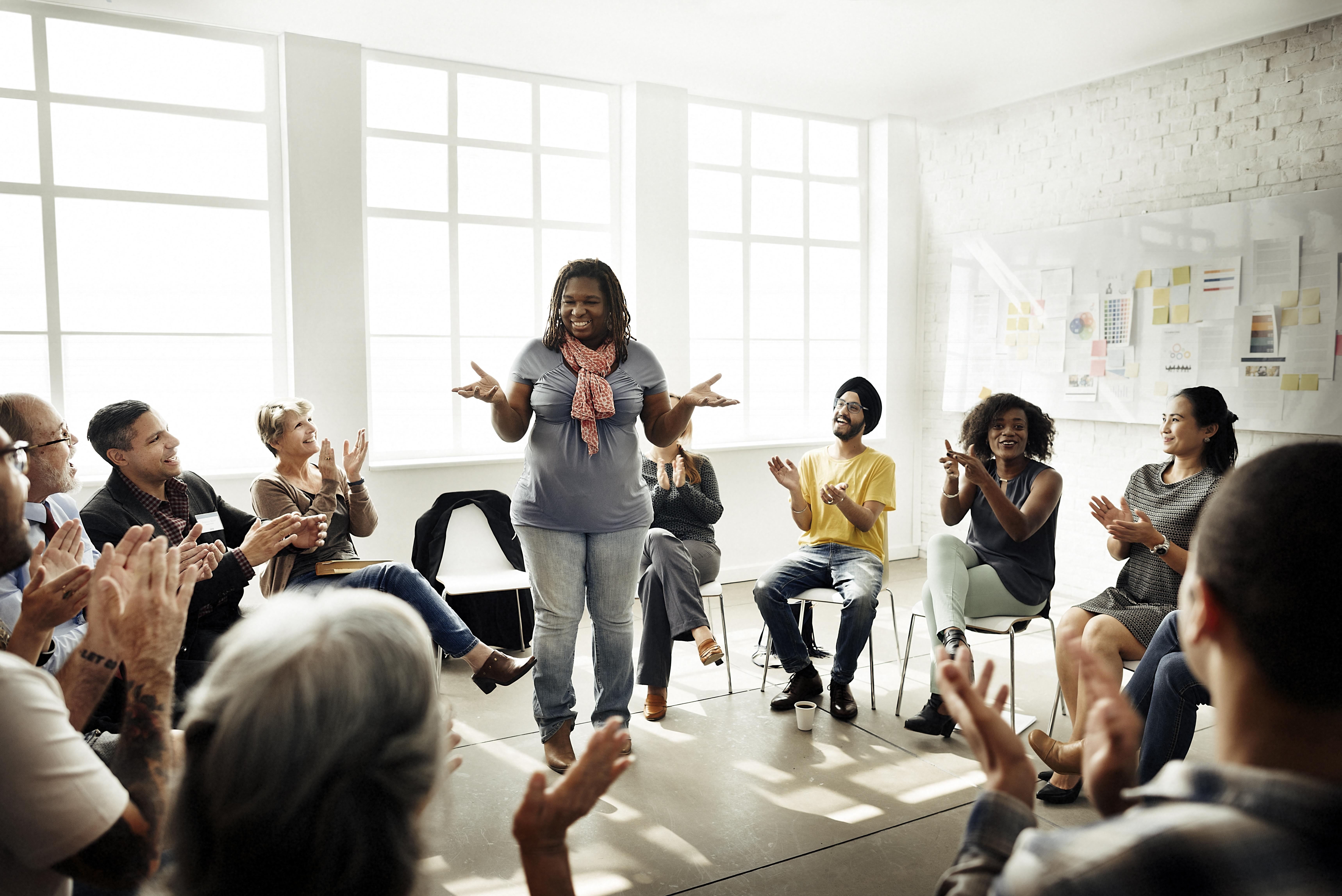 Group of people listening to a presentation