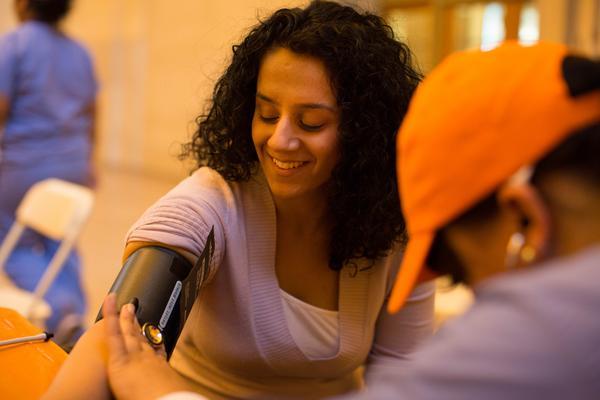 Woman getting her blood pressure taken at a KEEP Healthy Event