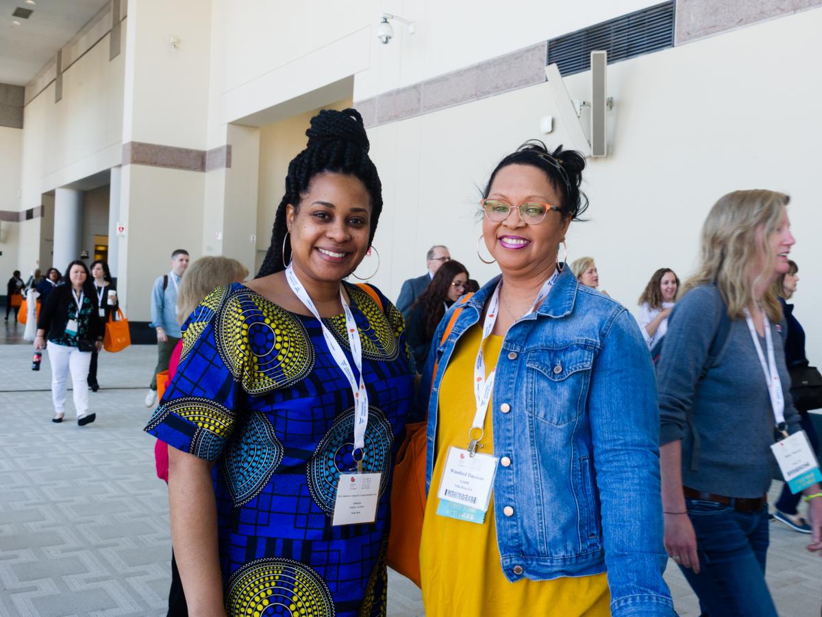 two ladies attending a conference