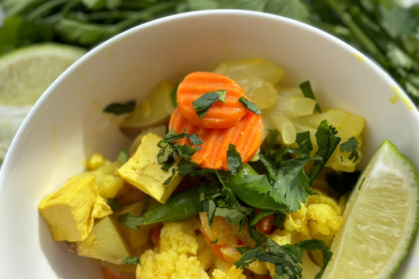 Bowl of vegetable tofu curry.