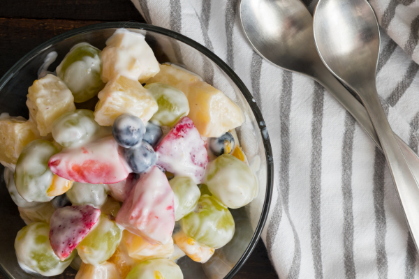 Bowl of yogurt covered fruit